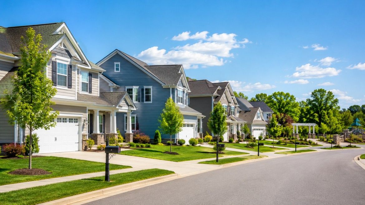 Single-Family Homeowners Association Community With Detached Homes, Private Driveways, And Maintained Landscaping